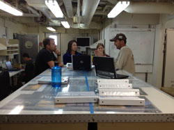 Researchers meeting in the drylab.
