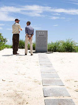 President Barack Obama views the Battle of Midway Memorial with USFWS Marine National Monuments Superintendent Matt Brown on Midway Atoll, Sept. 1, 2016.
