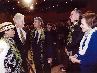 President Bill Clinton, Buzzy Agard, Tammy and Isaac Harp, and Sylvia Earle at the announcement of the Executive Order establishing the Northwestern Hawaiian Islands Coral Reef Ecosystem Reserve in 2001 at the National Geographic Society headquarters in Washington, DC.