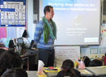 Daniel Wagner presenting to 4th grade students at Island Pacific Academy.