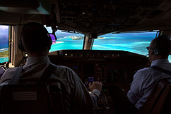 Air Force One pilots maneuver the final approach onto Midway Atoll.