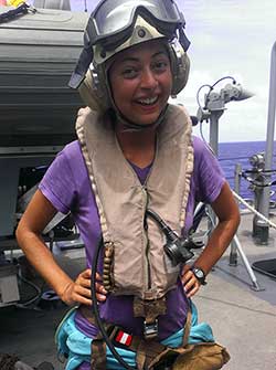 Megan Dalton prepared to get on an Osprey to Midway Island.   