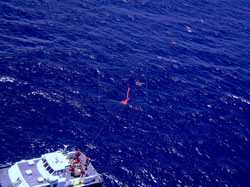 Shot taken from the UAS flying over the charter vessel and deployed marine debris props.