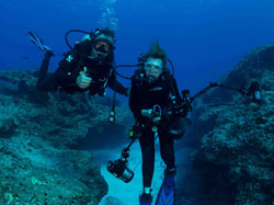 Dr. Sylvia Earle and Wyland share their first dive together at Midway Atoll National Wildlife Refuge.