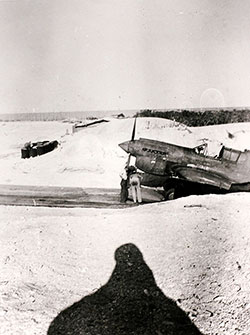 A P-40K of United States Army Air Forces (USAAF) 78th Fighter Squadron, in an Eastern Island revetment while stationed at Midway from January 23 until April 21, 1943.