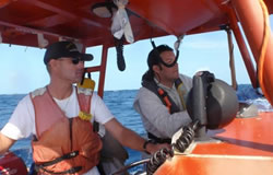 Jason Kehn and Michael Krivor conduct remote sensing survey at Midway Atoll.