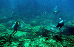 Ecological assessment team surveys the Quartette shipwreck site alongside maritime archaeologists.