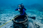 Maritime archaeologist Jason Raupp surveys the whaling shipwreck site Two Brothers at French Frigate Shoals