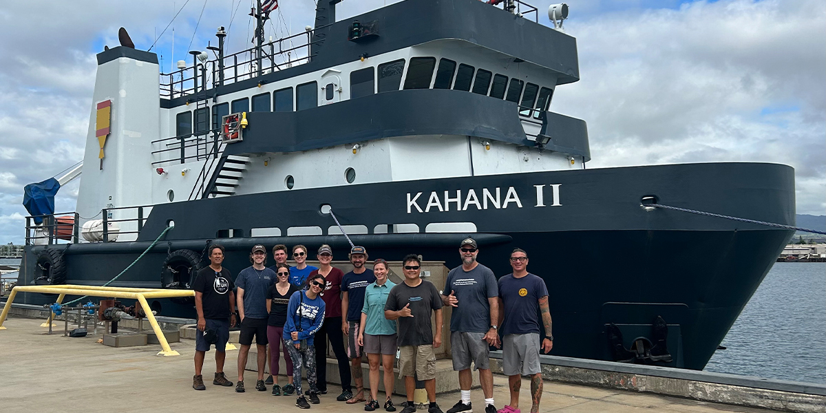 Researchers part of the 23-day Chondria mission posing infront of the Kahana II